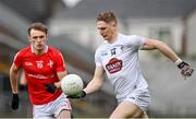 1 May 2022; Daniel Flynn of Kildare in action against Leonard Grey of Louth during the Leinster GAA Football Senior Championship Quarter-Final match between Kildare and Louth at O'Connor Park in Tullamore, Offaly. Photo by Seb Daly/Sportsfile