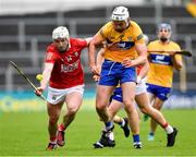 1 May 2022; Patrick Horgan of Cork is tackled by Conor Cleary of Clare during the Munster GAA Hurling Senior Championship Round 3 match between Cork and Clare at FBD Semple Stadium in Thurles, Tipperary. Photo by Ray McManus/Sportsfile