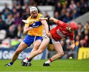1 May 2022; Alan Connolly of Cork is tackled by Conor Cleary of Clare during the Munster GAA Hurling Senior Championship Round 3 match between Cork and Clare at FBD Semple Stadium in Thurles, Tipperary. Photo by Ray McManus/Sportsfile