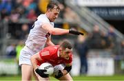 1 May 2022; Niall Sharkey of Louth in action against Darragh Kirwan of Kildare during the Leinster GAA Football Senior Championship Quarter-Final match between Kildare and Louth at O'Connor Park in Tullamore, Offaly. Photo by Seb Daly/Sportsfile