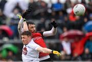1 May 2022; Louth goalkeeper James Califf in action against Jimmy Hyland of Kildare during the Leinster GAA Football Senior Championship Quarter-Final match between Kildare and Louth at O'Connor Park in Tullamore, Offaly. Photo by Seb Daly/Sportsfile