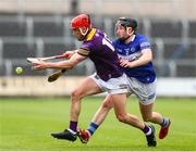 1 May 2022; Conor Hearne of Wexford in action against Donnchada Hartnett of Laois during the Leinster GAA Hurling Senior Championship Round 3 match between Laois and Wexford at MW Hire O’Moore Park in Portlaoise, Laois. Photo by Michael P Ryan/Sportsfile