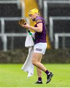 1 May 2022; Damien Reck of Wexford dries his hurley during the Leinster GAA Hurling Senior Championship Round 3 match between Laois and Wexford at MW Hire O’Moore Park in Portlaoise, Laois. Photo by Michael P Ryan/Sportsfile