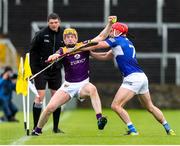 1 May 2022; Simon Donohoe of Wexford in action against Jack Kelly of Laois during the Leinster GAA Hurling Senior Championship Round 3 match between Laois and Wexford at MW Hire O’Moore Park in Portlaoise, Laois. Photo by Michael P Ryan/Sportsfile