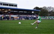 30 April 2022; Brian Donovan of Limerick scores his penalty in the penalty shoot-out of the Munster GAA Senior Football Championship Quarter-Final match between Clare and Limerick at Cusack Park in Ennis, Clare. Photo by Piaras Ó Mídheach/Sportsfile