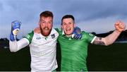 30 April 2022; Limerick players Donal O Sullivan, left, and Iain Corbett celebrate after their side's victory in the penalty shoot-out of the Munster GAA Senior Football Championship Quarter-Final match between Clare and Limerick at Cusack Park in Ennis, Clare. Photo by Piaras Ó Mídheach/Sportsfile