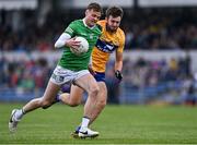 30 April 2022; Brian Donovan of Limerick in action against Manus Doherty of Clare during the Munster GAA Senior Football Championship Quarter-Final match between Clare and Limerick at Cusack Park in Ennis, Clare. Photo by Piaras Ó Mídheach/Sportsfile