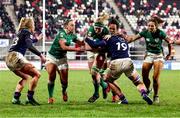 30 April 2022; Sam Monaghan of Ireland is tackled by Louise McMillan of Scotland during the Tik Tok Women's Six Nations Rugby Championship match between Ireland and Scotland at Kingspan Stadium in Belfast. Photo by John Dickson/Sportsfile