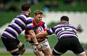 1 May 2022; Conor Kelly of Clontarf is tackled by Harrison Brewerand and Peter Sylvester of Terenure College during the Energia All-Ireland League Division 1 Final match between Clontarf and Terenure at Aviva Stadium in Dublin. Photo by Oliver McVeigh/Sportsfile