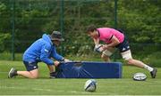 2 May 2022; Ryan Baird, right, and forwards and scrum coach Robin McBryde during a Leinster Rugby squad training session at UCD in Dublin. Photo by Seb Daly/Sportsfile