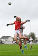 1 May 2022; Bevan Duffy of Louth in action against Darragh Kirwan of Kildare during the Leinster GAA Football Senior Championship Quarter-Final match between Kildare and Louth at O'Connor Park in Tullamore, Offaly. Photo by Seb Daly/Sportsfile