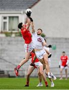 1 May 2022; Tommy Durnin of Louth in action against Kevin O’Callaghan of Kildare during the Leinster GAA Football Senior Championship Quarter-Final match between Kildare and Louth at O'Connor Park in Tullamore, Offaly. Photo by Seb Daly/Sportsfile