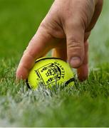 1 May 2022; A sliotar is picked from the grass during the Munster GAA Hurling Senior Championship Round 3 match between Cork and Clare at FBD Semple Stadium in Thurles, Tipperary. Photo by Ray McManus/Sportsfile