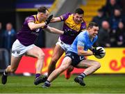 30 April 2022; Con O'Callaghan of Dublin in action against Glen Malone and Mark Rossiter of Wexford, left, during the Leinster GAA Football Senior Championship Quarter-Final match between Wexford and Dublin at Chadwicks Wexford Park in Wexford. Photo by Ray McManus/Sportsfile