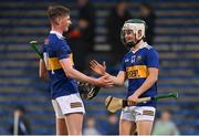 3 May 2022; Joe Egan, left, and Tom Delaney of Tipperary celebrate after the Electric Ireland Munster GAA Minor Hurling Championship Semi-Final match between Tipperary and Waterford at FBD Semple Stadium in Thurles, Tipperary. Photo by Brendan Moran/Sportsfile