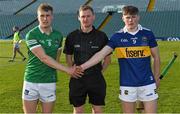 4 May 2022; Referee Niall Malone with team captains Jimmy Quilty of Limerick and John Campion of Tipperary before the oneills.com Munster GAA Hurling U20 Championship Final match between Limerick and Tipperary at TUS Gaelic Grounds in Limerick. Photo by Seb Daly/Sportsfile