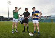 4 May 2022; Referee Niall Malone with team captains Jimmy Quilty of Limerick and John Campion of Tipperary during the coin toss before the oneills.com Munster GAA Hurling U20 Championship Final match between Limerick and Tipperary at TUS Gaelic Grounds in Limerick. Photo by Seb Daly/Sportsfile