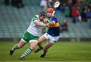 4 May 2022; Limerick goalkeeper Conor Hanley Clarke in action against Jack Leamy of Tipperary during the oneills.com Munster GAA Hurling U20 Championship Final match between Limerick and Tipperary at TUS Gaelic Grounds in Limerick. Photo by Seb Daly/Sportsfile
