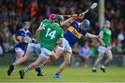 4 May 2022; Luke Shanahan of Tipperary in action against Donnacha O’Dalaigh of Limerick during the oneills.com Munster GAA Hurling U20 Championship Final match between Limerick and Tipperary at TUS Gaelic Grounds in Limerick. Photo by Seb Daly/Sportsfile