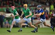 4 May 2022; Adam English of Limerick in action against James Armstrong of Tipperary during the oneills.com Munster GAA Hurling U20 Championship Final match between Limerick and Tipperary at TUS Gaelic Grounds in Limerick. Photo by Seb Daly/Sportsfile