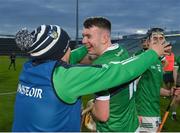 4 May 2022; Patrick Reale of Limerick and manager Diarmuid Mullins celebrate after their side's victory in the oneills.com Munster GAA Hurling U20 Championship Final match between Limerick and Tipperary at TUS Gaelic Grounds in Limerick. Photo by Seb Daly/Sportsfile
