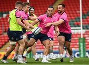 6 May 2022; James Lowe, centre, is tackled by Rónan Kelleher, right, during the Leinster Rugby captain's run at Mattoli Woods Welford Road in Leicester, England. Photo by Harry Murphy/Sportsfile