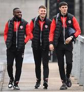 6 May 2022; Derry City players, from left, James Akintunde, Gerard Storey and Eoin Toal arrive for the SSE Airtricity League Premier Division match between Derry City and Bohemians at The Ryan McBride Brandywell Stadium in Derry. Photo by Stephen McCarthy/Sportsfile