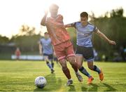 6 May 2022; Greg Sloggett of Dundalk in action against Evan Osam of UCD during the SSE Airtricity League Premier Division match between UCD and Dundalk at UCD Bowl in Belfield, Dublin. Photo by Ben McShane/Sportsfile