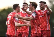 6 May 2022; Paul Doyle of Dundalk, left, celebrates with teammates after scoring his side's first goal during the SSE Airtricity League Premier Division match between UCD and Dundalk at UCD Bowl in Belfield, Dublin. Photo by Ben McShane/Sportsfile