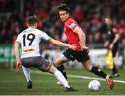 6 May 2022; Matty Smith of Derry City in action against Sam Packham of Bohemians during the SSE Airtricity League Premier Division match between Derry City and Bohemians at The Ryan McBride Brandywell Stadium in Derry. Photo by Stephen McCarthy/Sportsfile