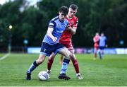 6 May 2022; Dara Keane of UCD in action against Lewis Macari of Dundalk during the SSE Airtricity League Premier Division match between UCD and Dundalk at UCD Bowl in Belfield, Dublin. Photo by Ben McShane/Sportsfile