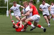6 May 2022; Conor McKee of Ulster is tackled by Paddy Patterson of Munster during an 'A' Interprovincial match between Munster and Ulster at University of Limerick in Limerick. Photo by John Dickson/Sportsfile