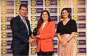 6 May 2022; The 2022 Teams of the Lidl Ladies National Football League awards were presented at Croke Park on Friday, May 6. The best players from the four divisions in the Lidl National Football Leagues were selected by the LGFA’s All Star committee. Shauna Ennis of Meath pictured receiving her Division 1 award from President of the LGFA Mícheál Naughton, and Aoife Clarke, Communications and CSR Director, Lidl Ireland. Photo by Ramsey Cardy/Sportsfile