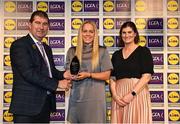 6 May 2022; The 2022 Teams of the Lidl Ladies National Football League awards were presented at Croke Park on Friday, May 6. The best players from the four divisions in the Lidl National Football Leagues were selected by the LGFA’s All Star committee. Monica McGuirk of Meath pictured receiving her Division 1 award from President of the LGFA Mícheál Naughton, and Aoife Clarke, Communications and CSR Director, Lidl Ireland. Photo by Ramsey Cardy/Sportsfile