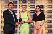 6 May 2022; The 2022 Teams of the Lidl Ladies National Football League awards were presented at Croke Park on Friday, May 6. The best players from the four divisions in the Lidl National Football Leagues were selected by the LGFA’s All Star committee. Orlagh Lally of Meath pictured receiving her Division 1 award from President of the LGFA Mícheál Naughton, and Aoife Clarke, Communications and CSR Director, Lidl Ireland. Photo by Ramsey Cardy/Sportsfile