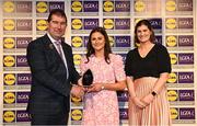 6 May 2022; The 2022 Teams of the Lidl Ladies National Football League awards were presented at Croke Park on Friday, May 6. The best players from the four divisions in the Lidl National Football Leagues were selected by the LGFA’s All Star committee. Emma Troy of Meath pictured receiving her Division 1 award from President of the LGFA Mícheál Naughton, and Aoife Clarke, Communications and CSR Director, Lidl Ireland. Photo by Ramsey Cardy/Sportsfile