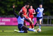 6 May 2022; Patrick Hoban of Dundalk is tackled by Eric Yoro of UCD during the SSE Airtricity League Premier Division match between UCD and Dundalk at UCD Bowl in Belfield, Dublin. Photo by Ben McShane/Sportsfile