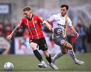 6 May 2022; Jamie McGonigle of Derry City in action against Jordan Doherty of Bohemians during the SSE Airtricity League Premier Division match between Derry City and Bohemians at The Ryan McBride Brandywell Stadium in Derry. Photo by Stephen McCarthy/Sportsfile