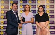 6 May 2022; The 2022 Teams of the Lidl Ladies National Football League awards were presented at Croke Park on Friday, May 6. The best players from the four divisions in the Lidl National Football Leagues were selected by the LGFA’s All Star committee. Bláithín Mackin of Armagh pictured receiving her Division 2 award from President of the LGFA Mícheál Naughton, and Aoife Clarke, Communications and CSR Director, Lidl Ireland. Photo by Ramsey Cardy/Sportsfile