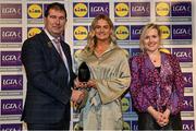 6 May 2022; The 2022 Teams of the Lidl Ladies National Football League awards were presented at Croke Park on Friday, May 6. The best players from the four divisions in the Lidl National Football Leagues were selected by the LGFA’s All Star committee. Róisín Ambrose of Limerick pictured receiving her Division 4 award from Mícheál Naughton, Ladies Gaelic Football Association President, and Fiona Fagan, Marketing Director, Lidl Ireland. Photo by Ramsey Cardy/Sportsfile
