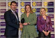 6 May 2022; The 2022 Teams of the Lidl Ladies National Football League awards were presented at Croke Park on Friday, May 6. The best players from the four divisions in the Lidl National Football Leagues were selected by the LGFA’s All Star committee. Cathy Mee of Limerick pictured receiving her Division 4 award from Mícheál Naughton, Ladies Gaelic Football Association President, and Fiona Fagan, Marketing Director, Lidl Ireland. Photo by Ramsey Cardy/Sportsfile
