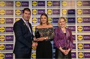 6 May 2022; The 2022 Teams of the Lidl Ladies National Football League awards were presented at Croke Park on Friday, May 6. The best players from the four divisions in the Lidl National Football Leagues were selected by the LGFA’s All Star committee. Annie Kehoe of Offaly pictured receiving her Division 4 award from Mícheál Naughton, Ladies Gaelic Football Association President, and Fiona Fagan, Marketing Director, Lidl Ireland. Photo by Ramsey Cardy/Sportsfile