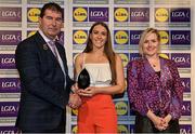 6 May 2022; The 2022 Teams of the Lidl Ladies National Football League awards were presented at Croke Park on Friday, May 6. The best players from the four divisions in the Lidl National Football Leagues were selected by the LGFA’s All Star committee. Róisín Ennis of Offaly pictured receiving her Division 4 award from Mícheál Naughton, Ladies Gaelic Football Association President, and Fiona Fagan, Marketing Director, Lidl Ireland. Photo by Ramsey Cardy/Sportsfile