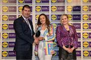 6 May 2022; The 2022 Teams of the Lidl Ladies National Football League awards were presented at Croke Park on Friday, May 6. The best players from the four divisions in the Lidl National Football Leagues were selected by the LGFA’s All Star committee. Becky Bryant of Offaly pictured receiving her Division 4 award from Mícheál Naughton, Ladies Gaelic Football Association President, and Fiona Fagan, Marketing Director, Lidl Ireland. Photo by Ramsey Cardy/Sportsfile