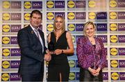 6 May 2022; The 2022 Teams of the Lidl Ladies National Football League awards were presented at Croke Park on Friday, May 6. The best players from the four divisions in the Lidl National Football Leagues were selected by the LGFA’s All Star committee. Laura Fleming of Roscommon pictured receiving her Division 3 award from Mícheál Naughton, Ladies Gaelic Football Association President, and Fiona Fagan, Marketing Director, Lidl Ireland. Photo by Ramsey Cardy/Sportsfile