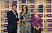 6 May 2022; The 2022 Teams of the Lidl Ladies National Football League awards were presented at Croke Park on Friday, May 6. The best players from the four divisions in the Lidl National Football Leagues were selected by the LGFA’s All Star committee. Jennifer Higgins of Roscommon pictured receiving her Division 3 award from Mícheál Naughton, Ladies Gaelic Football Association President, and Fiona Fagan, Marketing Director, Lidl Ireland. Photo by Ramsey Cardy/Sportsfile