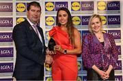 6 May 2022; The 2022 Teams of the Lidl Ladies National Football League awards were presented at Croke Park on Friday, May 6. The best players from the four divisions in the Lidl National Football Leagues were selected by the LGFA’s All Star committee. Ellee McEvoy of Offaly pictured receiving her Division 4 award from Mícheál Naughton, Ladies Gaelic Football Association President, and Fiona Fagan, Marketing Director, Lidl Ireland. Photo by Ramsey Cardy/Sportsfile