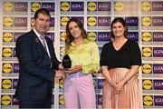 6 May 2022; The 2022 Teams of the Lidl Ladies National Football League awards were presented at Croke Park on Friday, May 6. The best players from the four divisions in the Lidl National Football Leagues were selected by the LGFA’s All Star committee. Mo Nerney of Laois pictured receiving her Division 2 award from President of the LGFA Mícheál Naughton, and Aoife Clarke, Communications and CSR Director, Lidl Ireland. Photo by Ramsey Cardy/Sportsfile