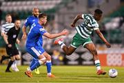 6 May 2022; Aidomo Emakhu of Shamrock Rovers in action against Rob Slevin of Finn Harps during the SSE Airtricity League Premier Division match between Shamrock Rovers and Finn Harps at Tallaght Stadium in Dublin. Photo by Seb Daly/Sportsfile