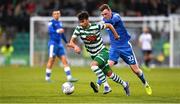 6 May 2022; Danny Mandroiu of Shamrock Rovers in action against Ryan Rainey of Finn Harps during the SSE Airtricity League Premier Division match between Shamrock Rovers and Finn Harps at Tallaght Stadium in Dublin. Photo by Seb Daly/Sportsfile